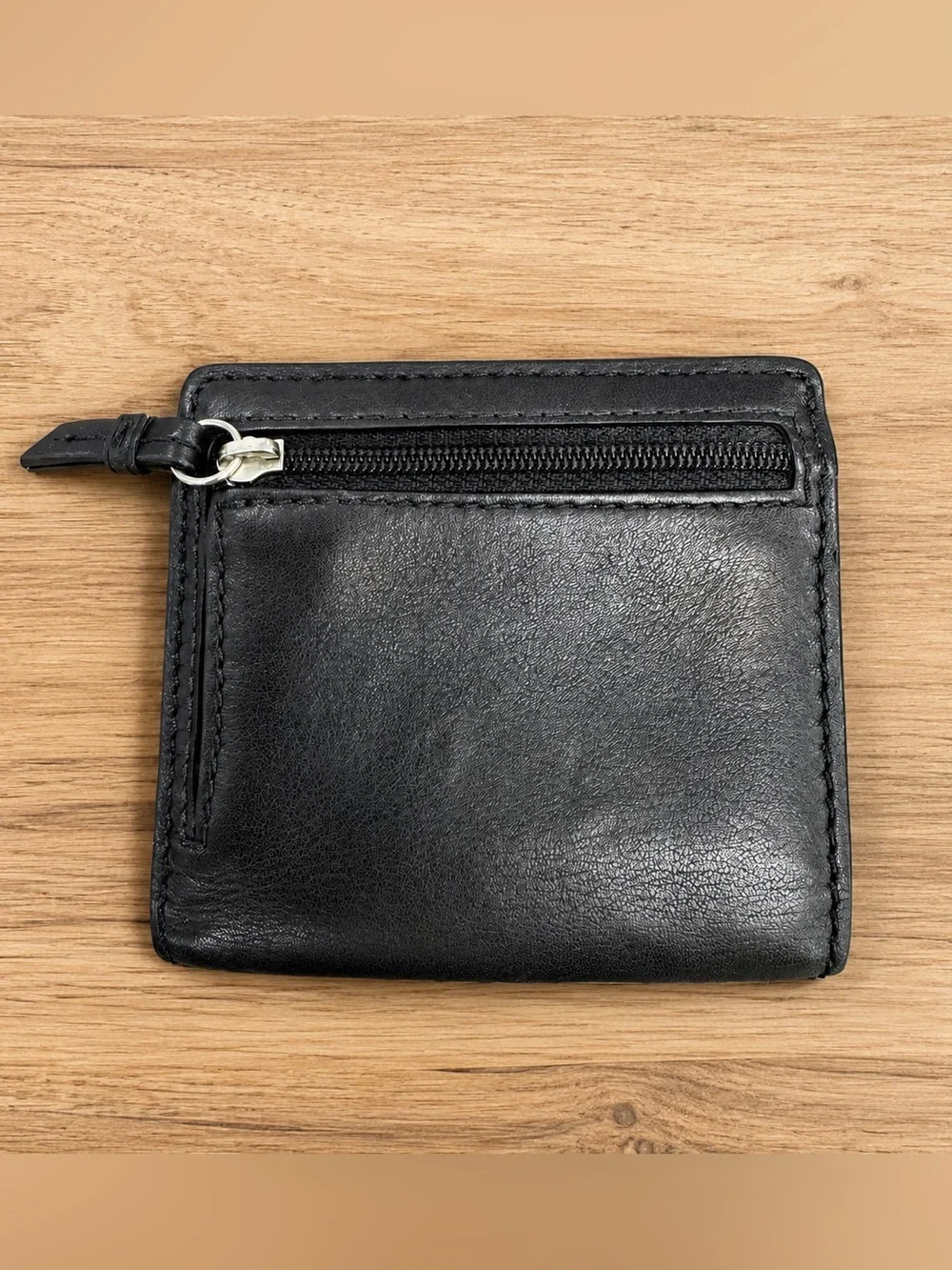 Coach Black Leather Compact Wallet with Embossed Logo